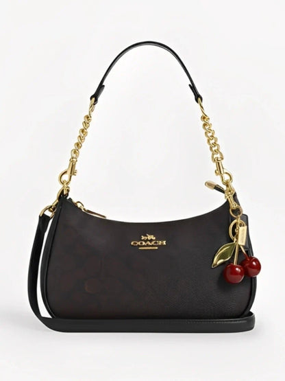 TERI SHOULDER BAG IN SIGNATURE CANVAS