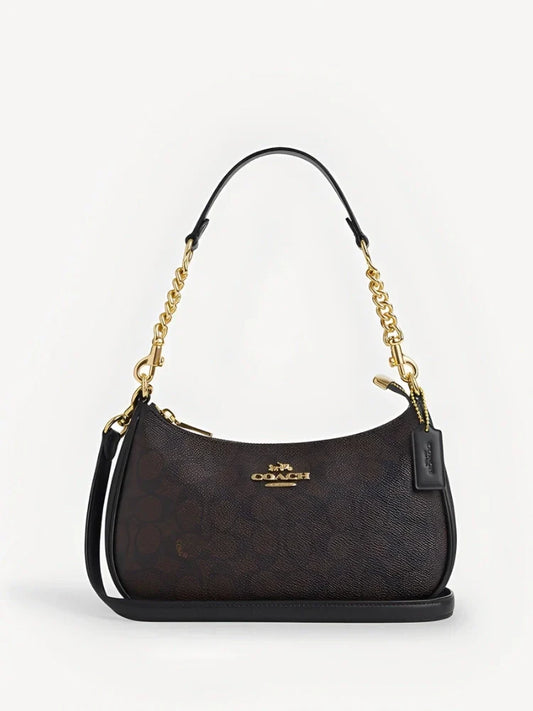 TERI SHOULDER BAG IN SIGNATURE CANVAS